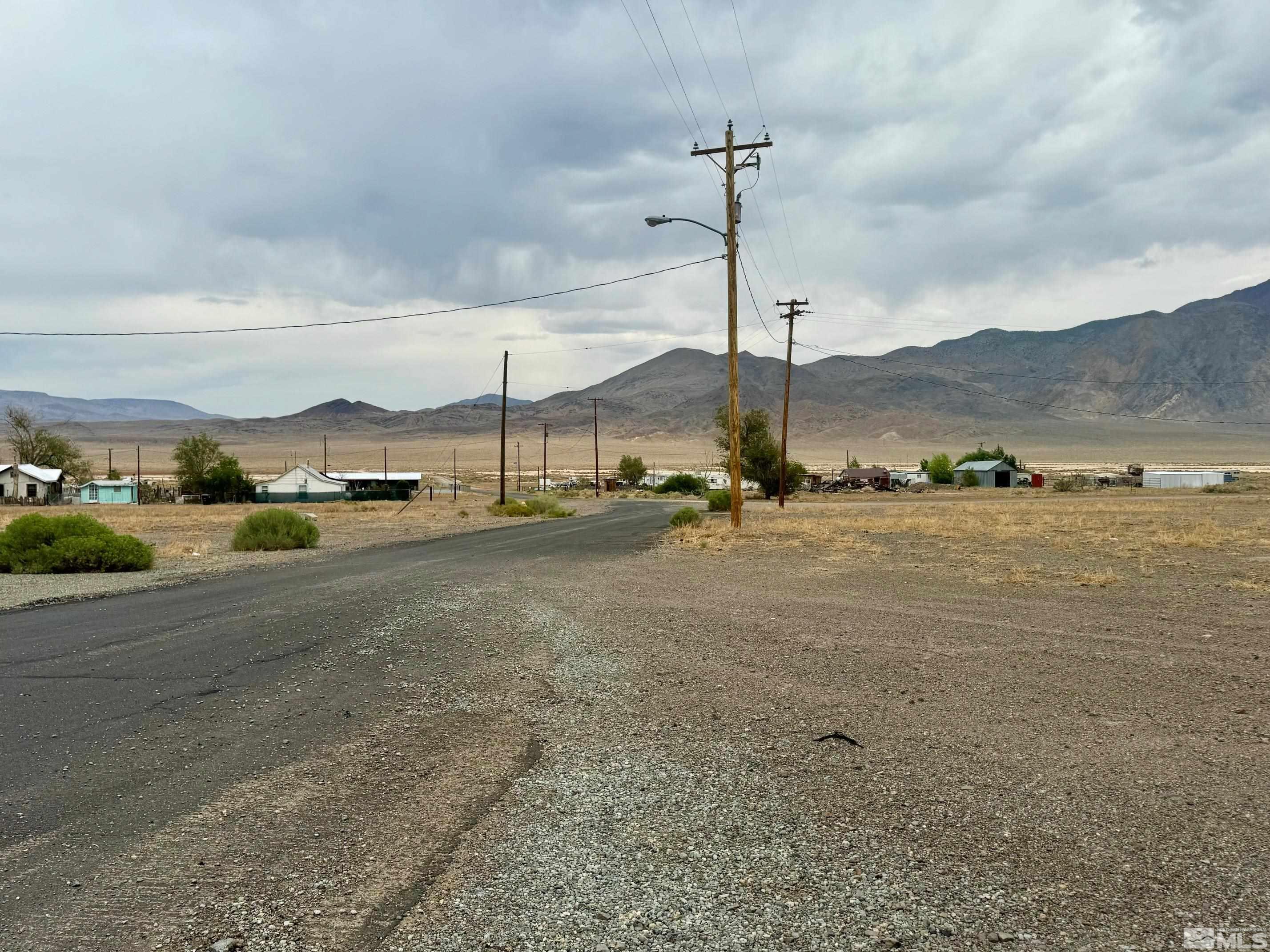 a view of a road with an ocean view