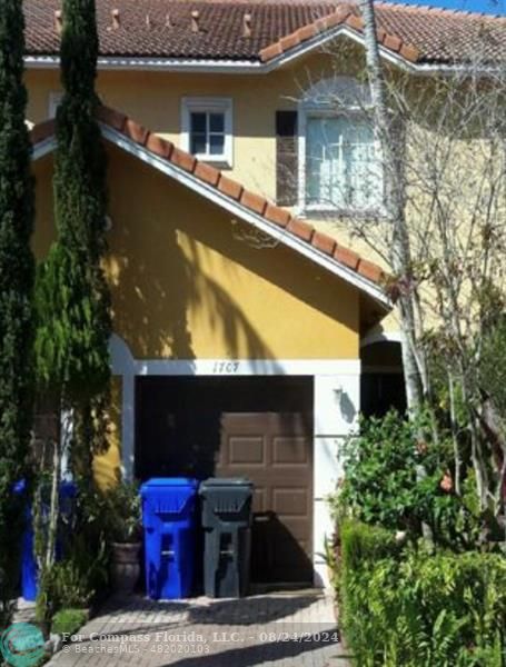 a view of house with outdoor space