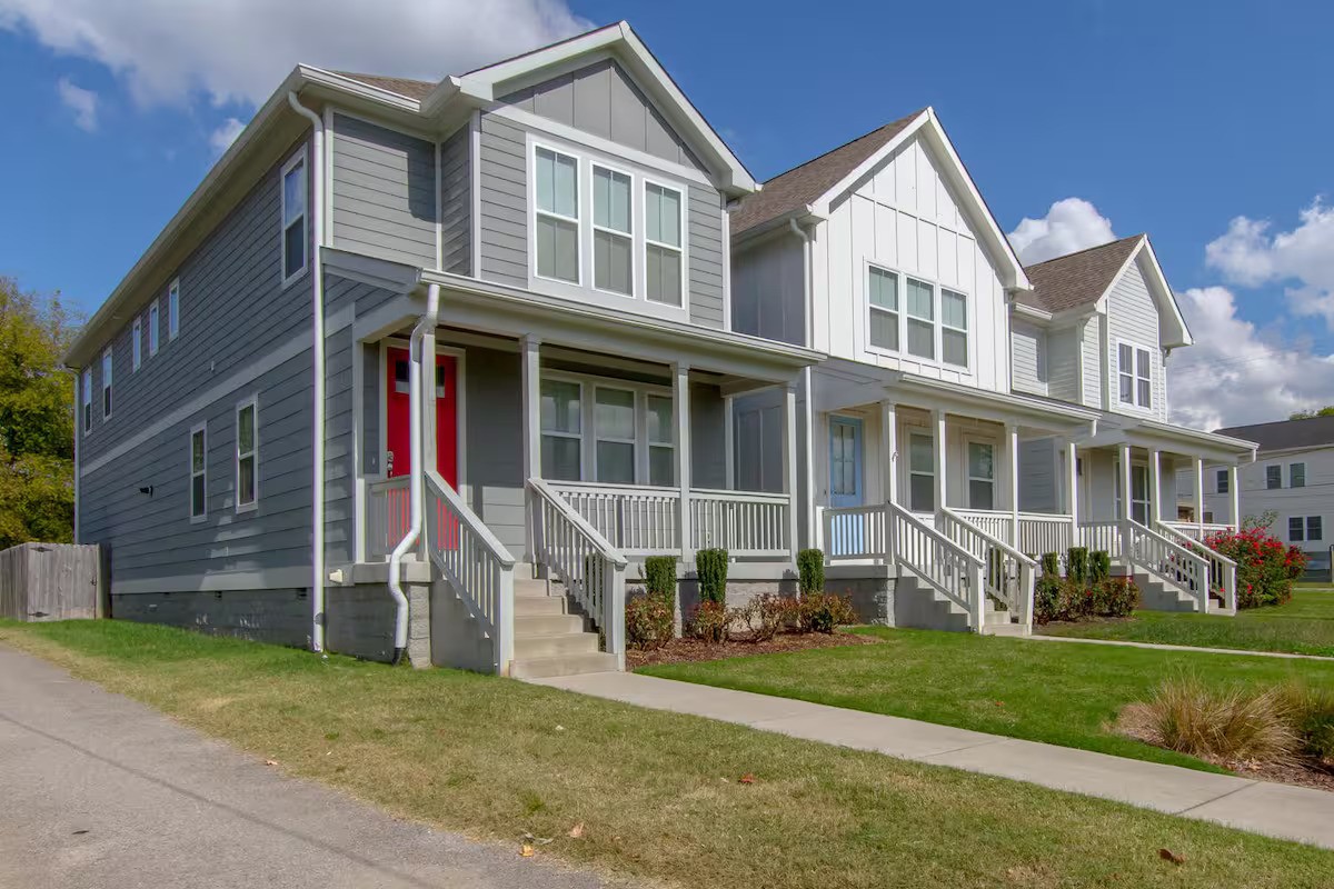 a view of house with yard