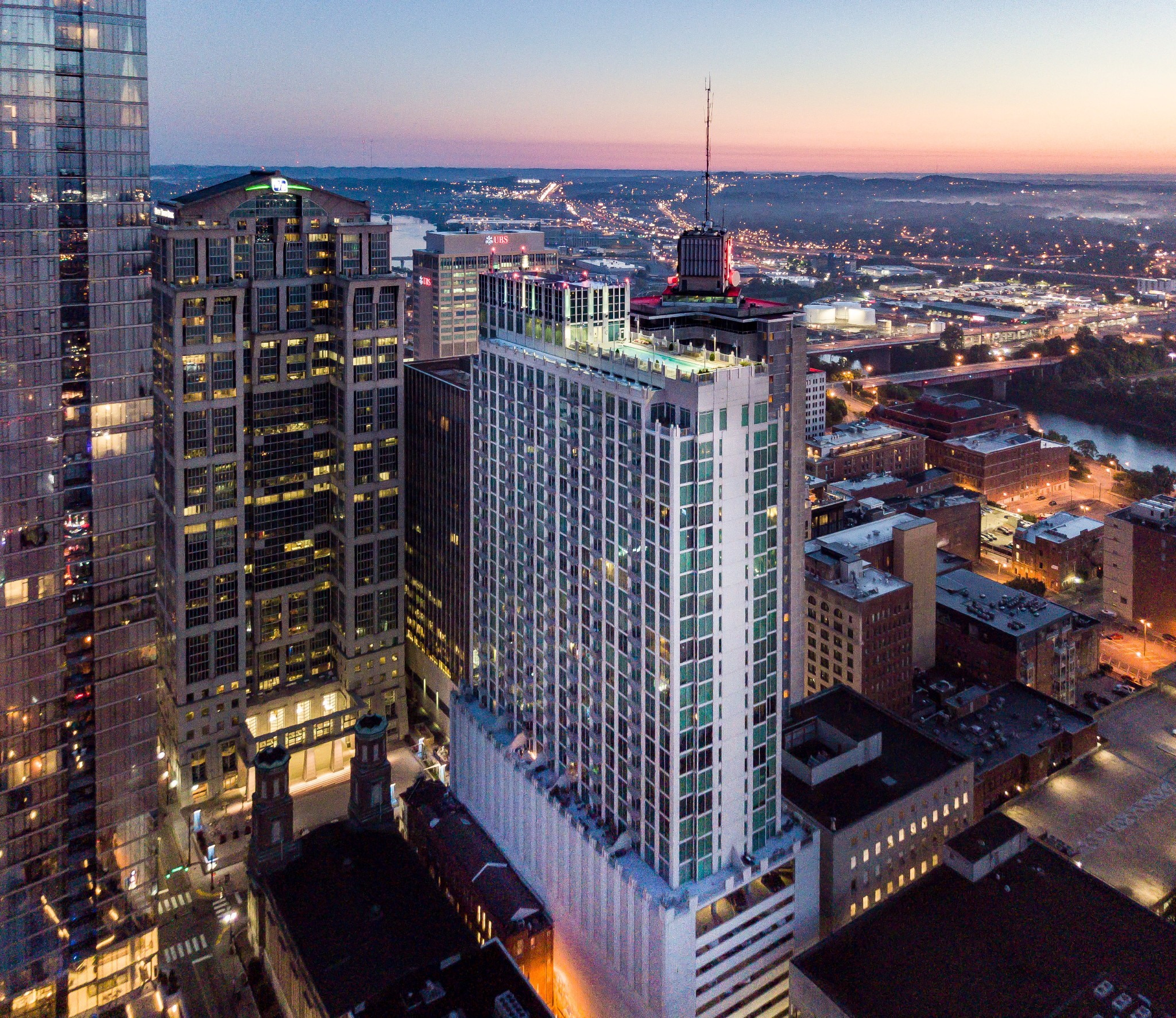 a view of a city with tall buildings