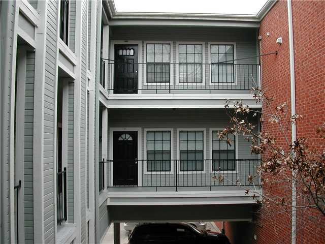 a view of building with a balcony