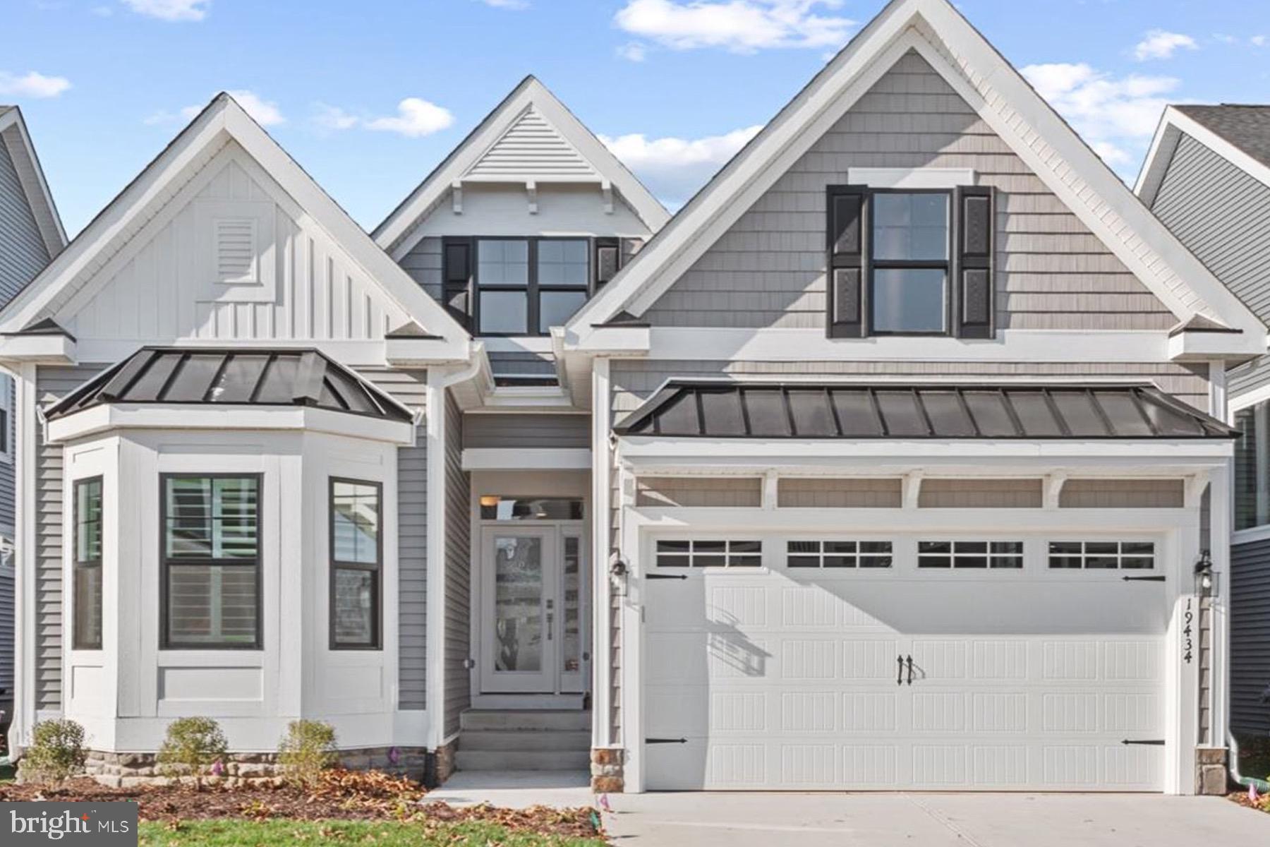 a front view of a house with a front door