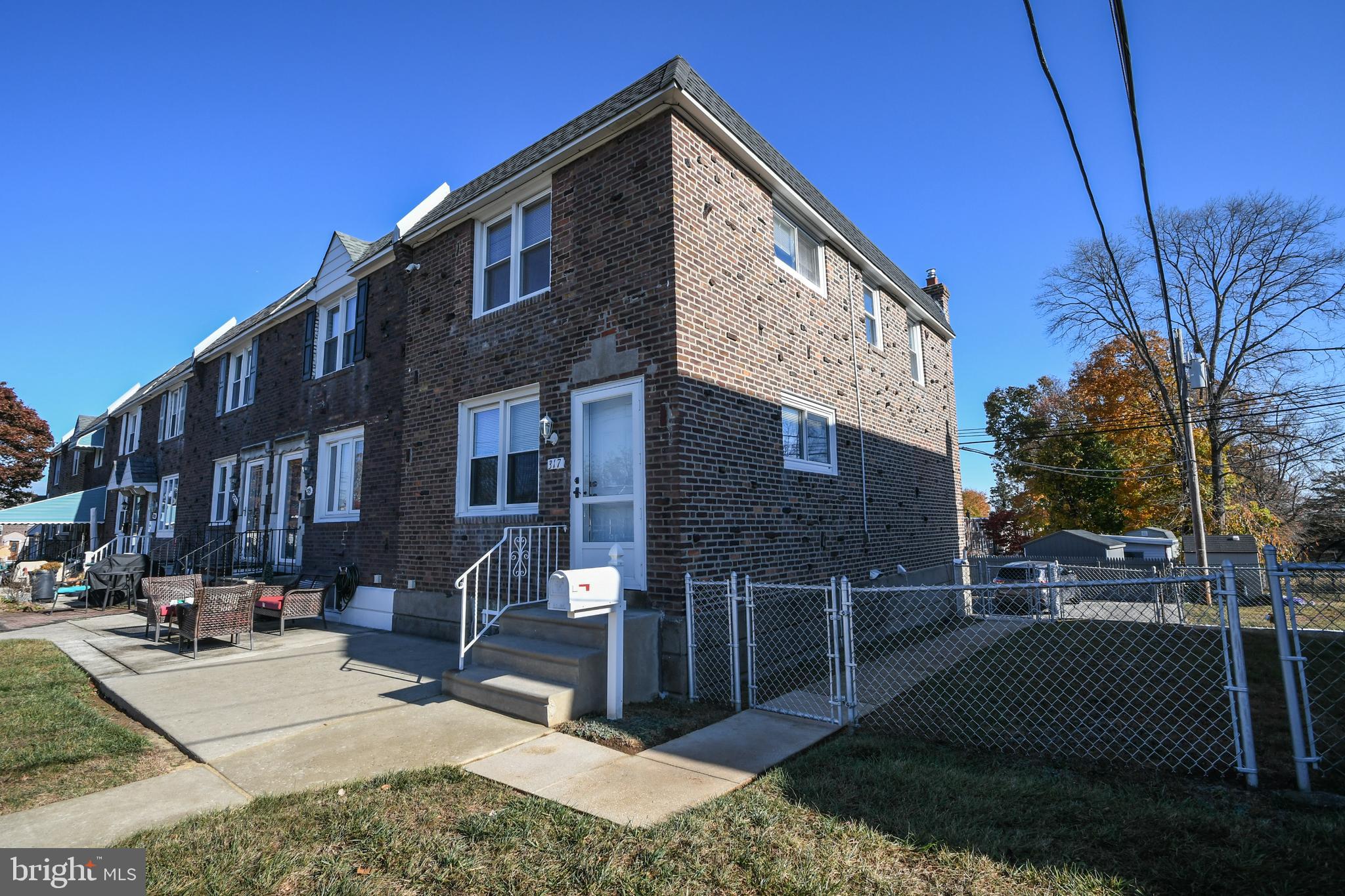 a view of a brick building with many windows