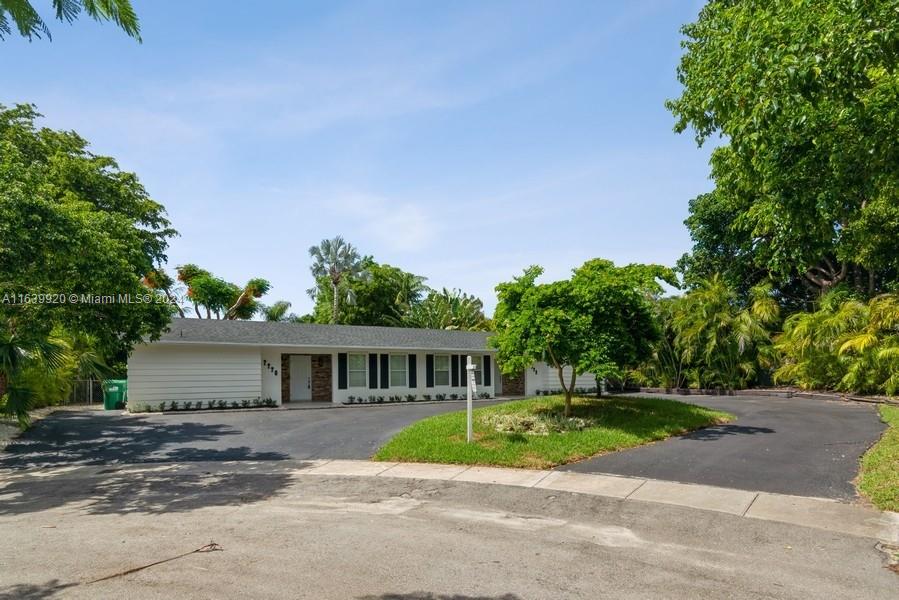 front view of house with a yard