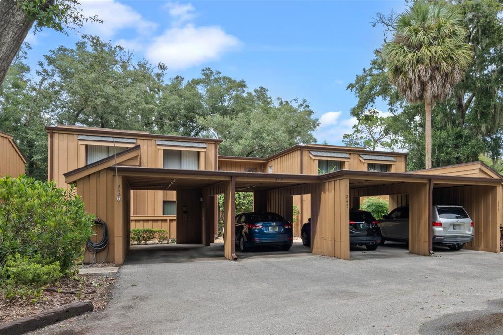 a view of a car park in front of house