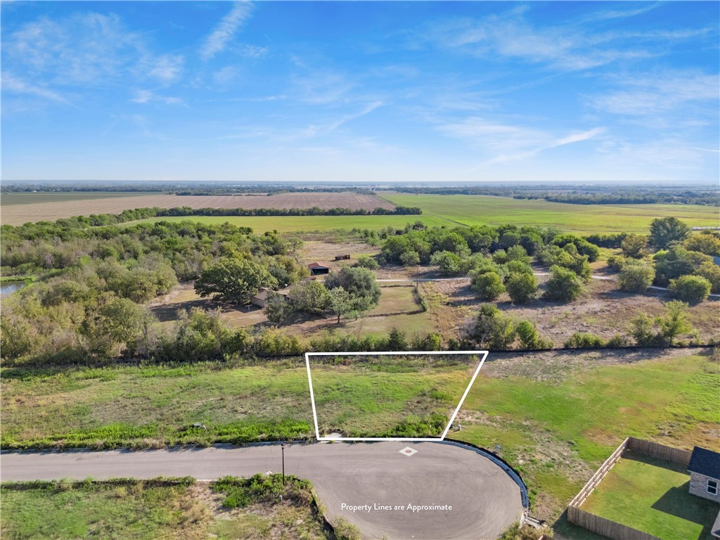 a view of a water with a big yard