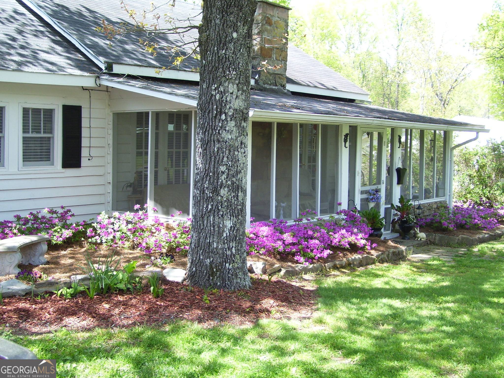 a front view of a house having outdoor space