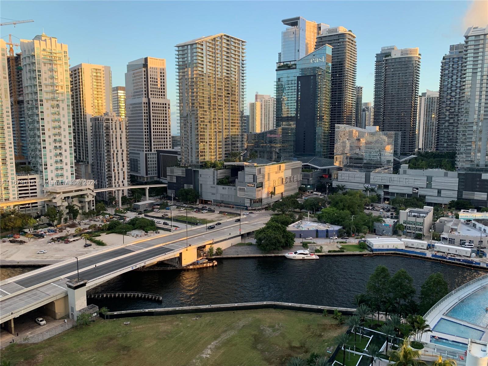 a view of a city with tall buildings