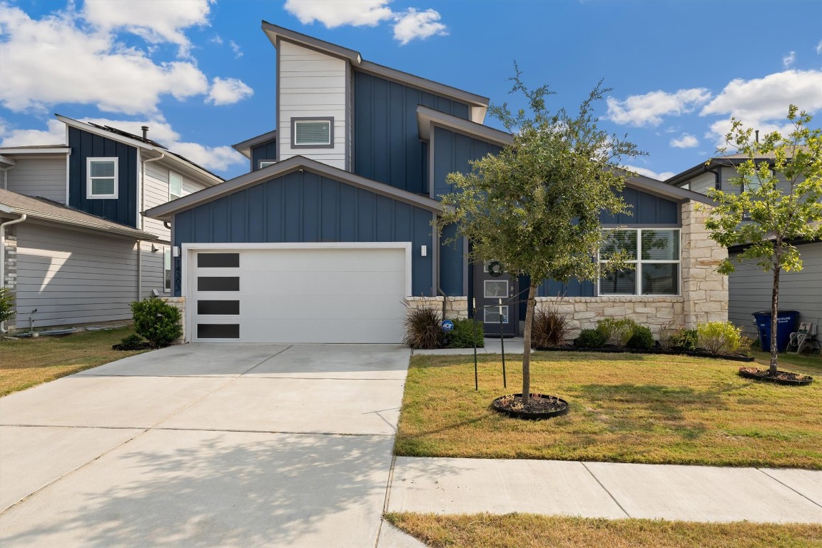 a front view of a house with entertaining space