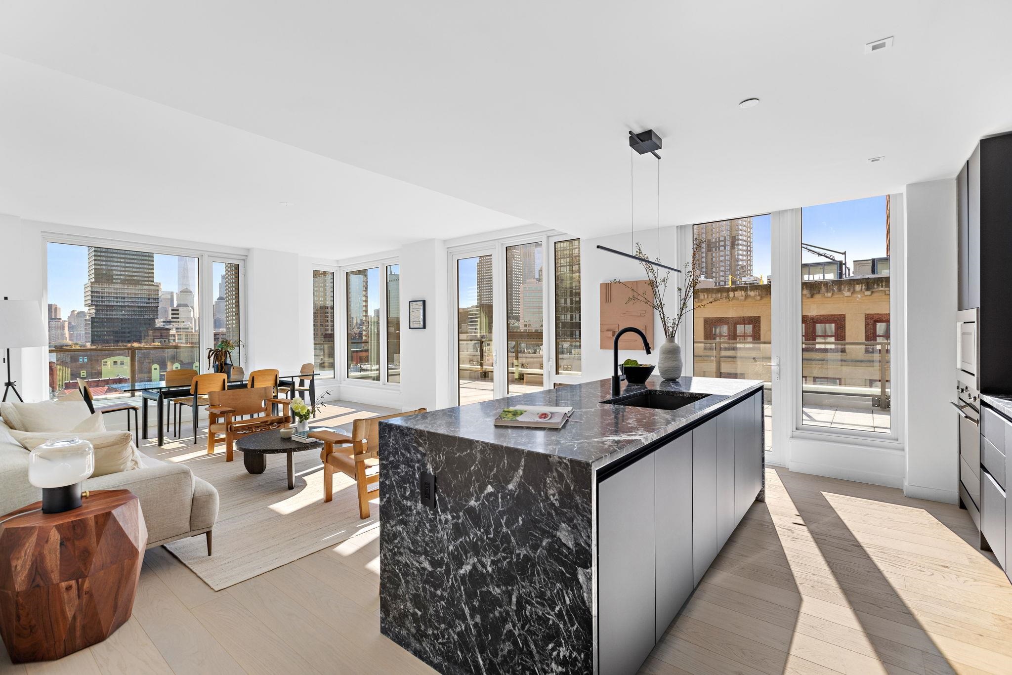 a kitchen with granite countertop a sink and a stove