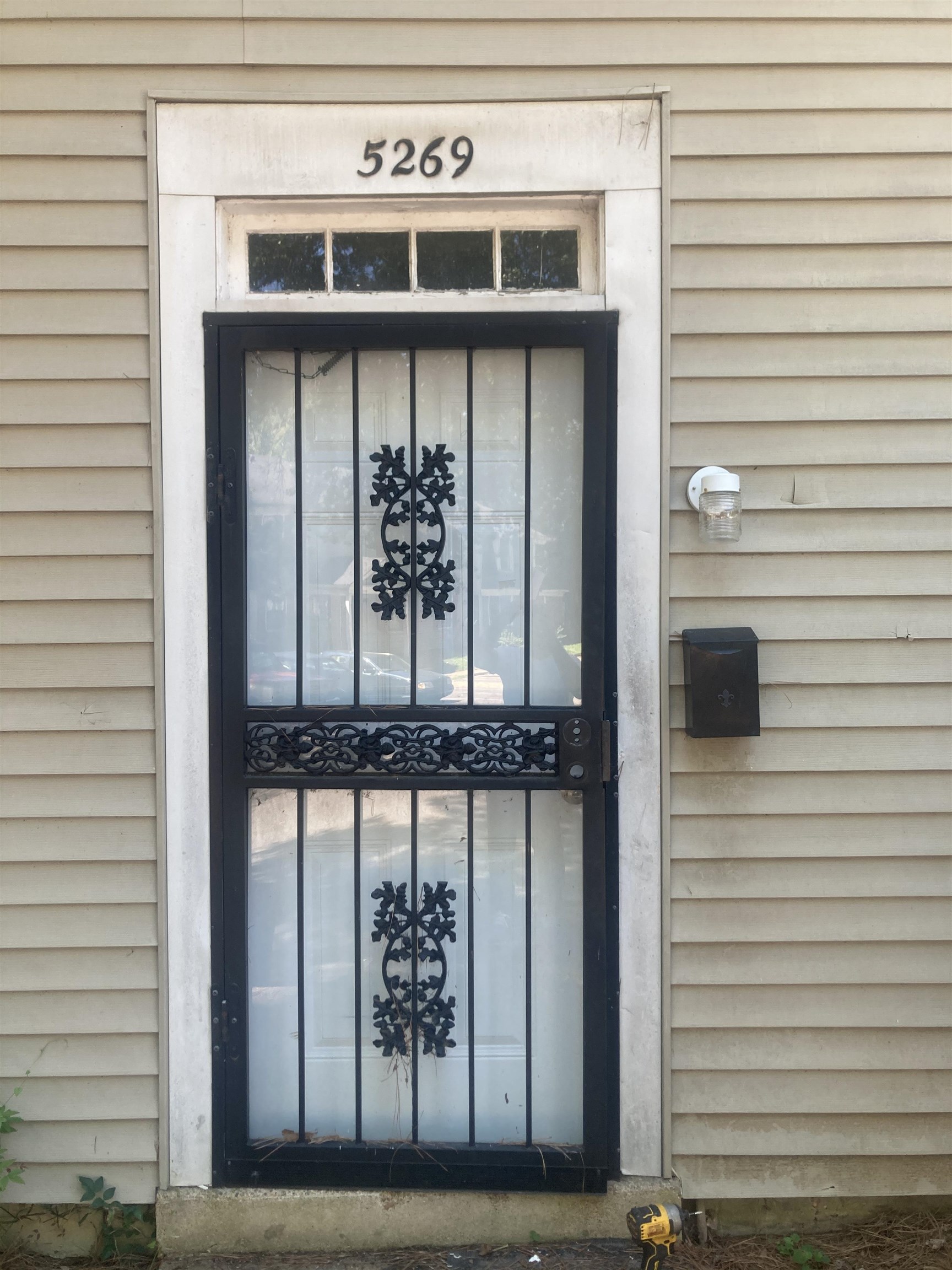 a view of a door and a window