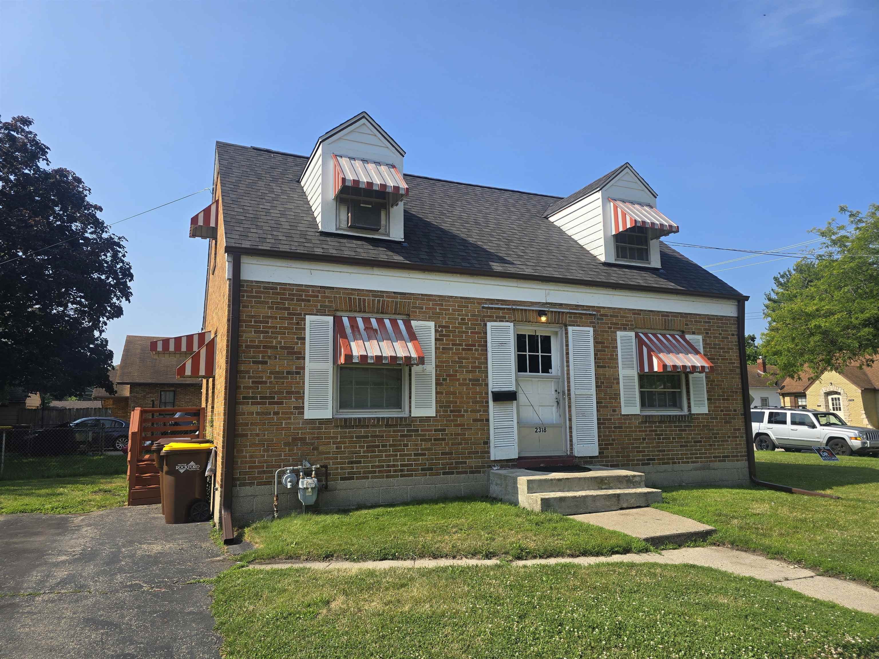 a front view of house with yard