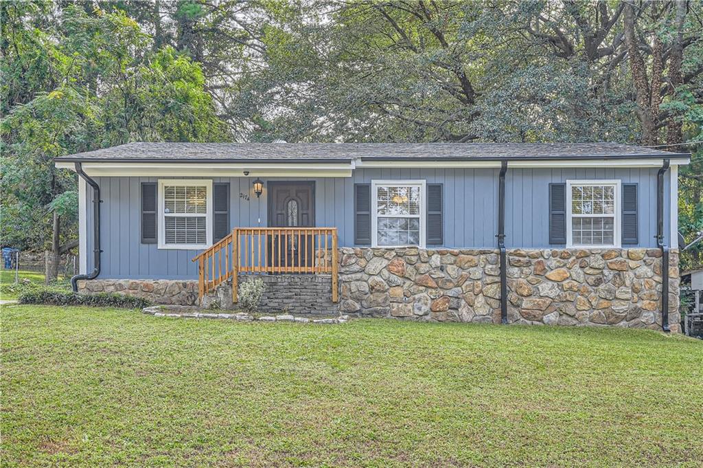 front view of a house with a yard