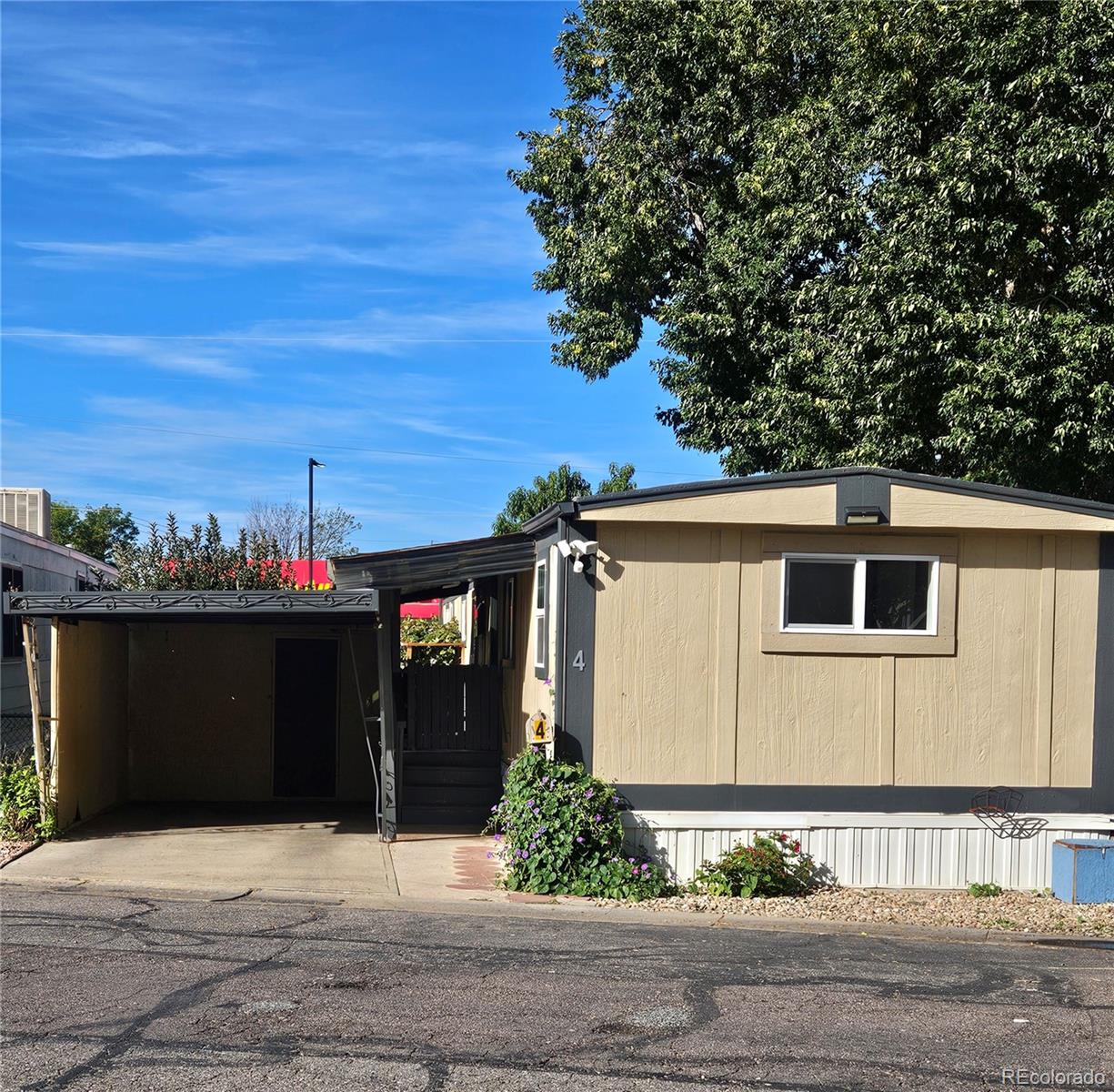 a front view of a house with yard