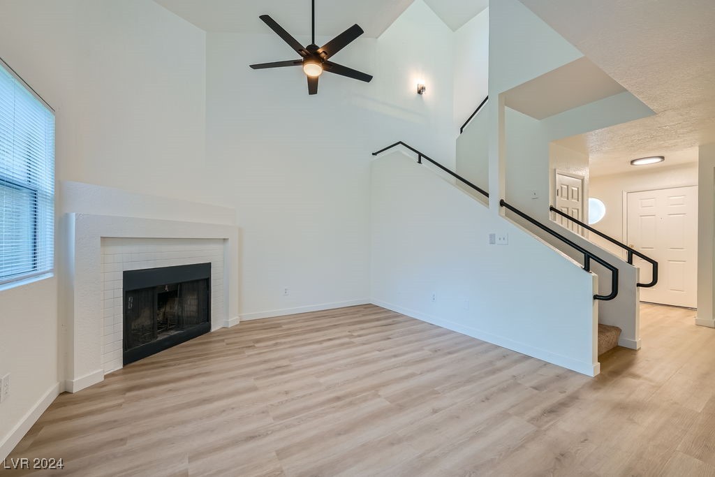 Living room features corner fireplace