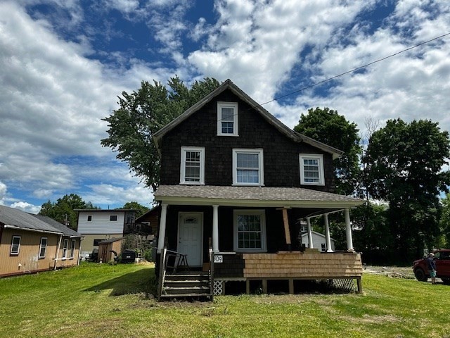 a front view of house with yard