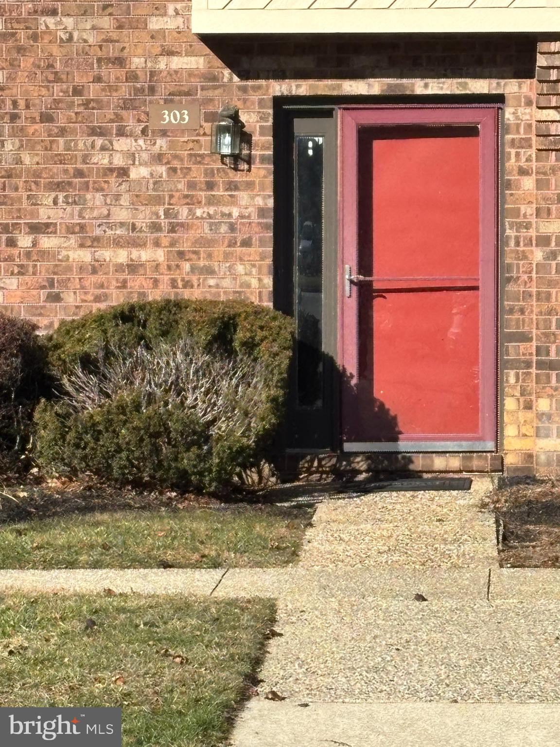 a view of a door and chair