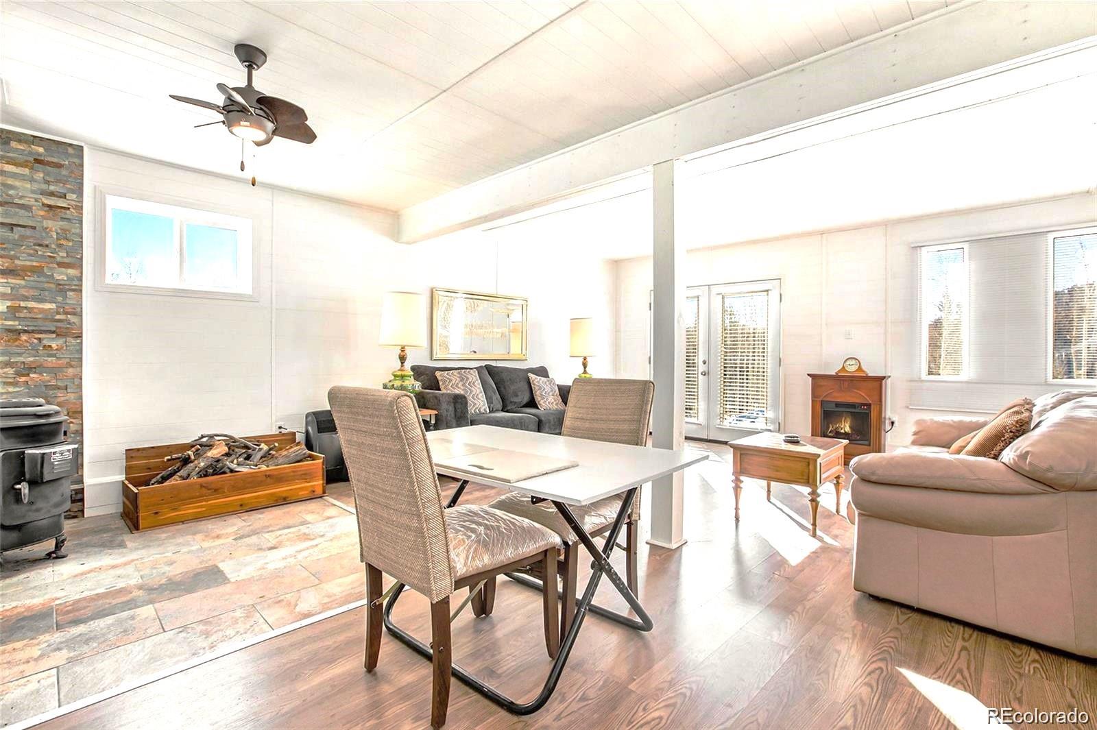 a view of a livingroom with furniture and a table