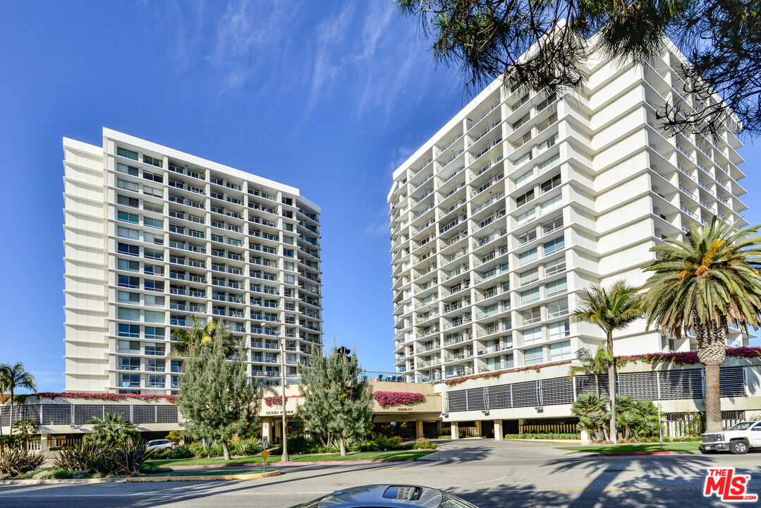 a front view of a building with a street