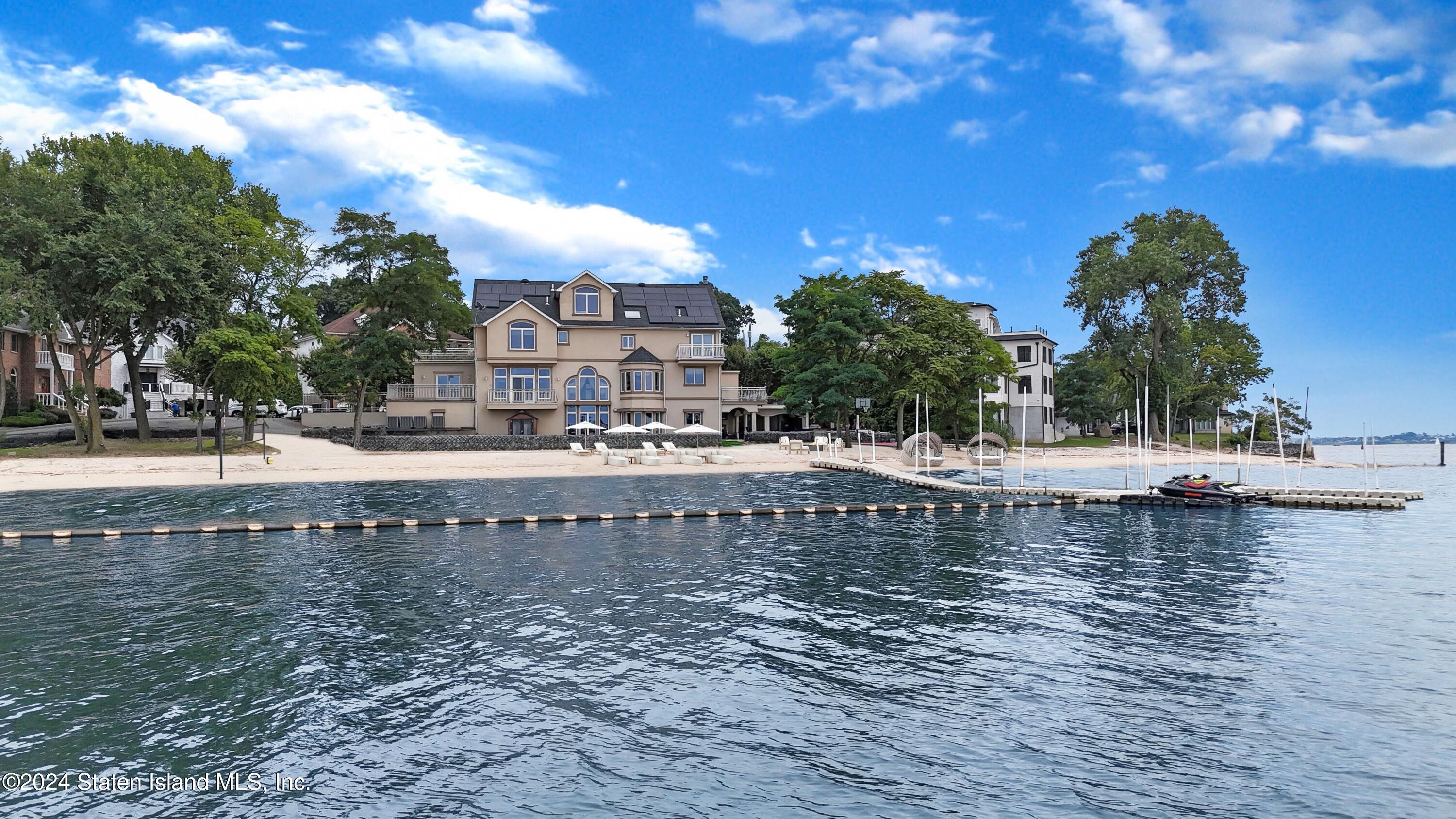 a view of a water fountain with a big yard