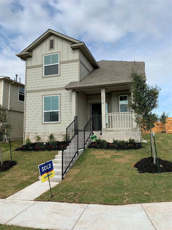 a front view of house with yard