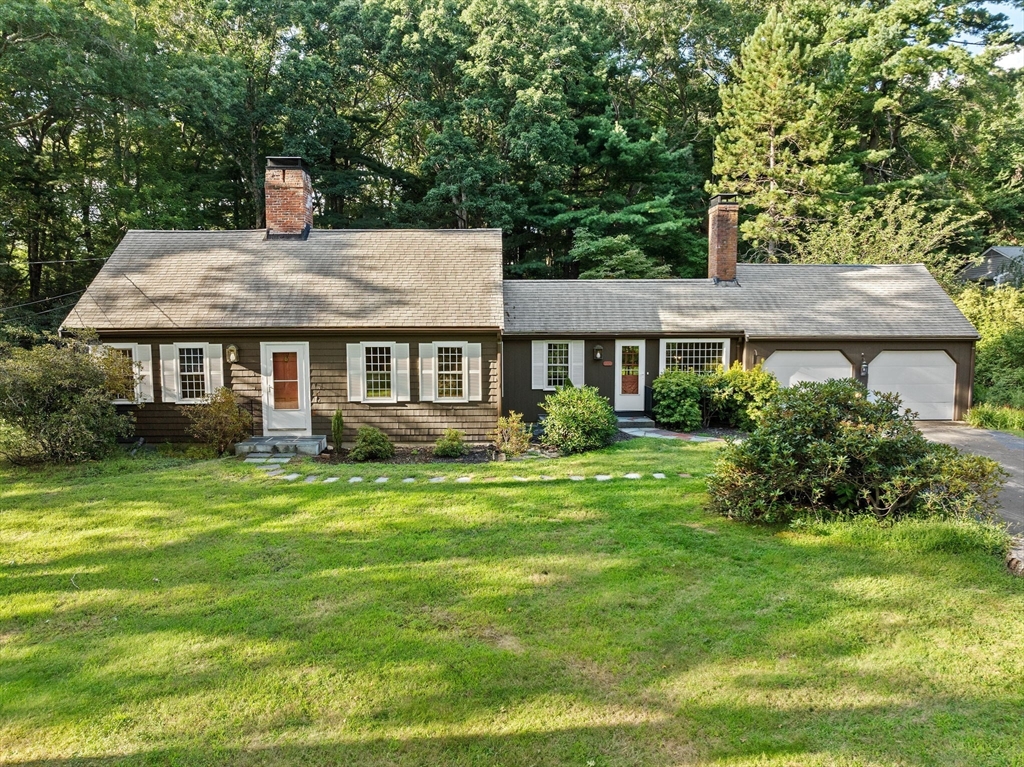 a house view with a garden space