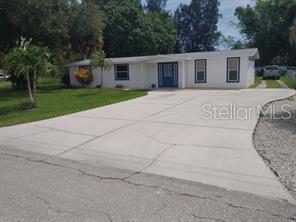 a front view of a house with yard