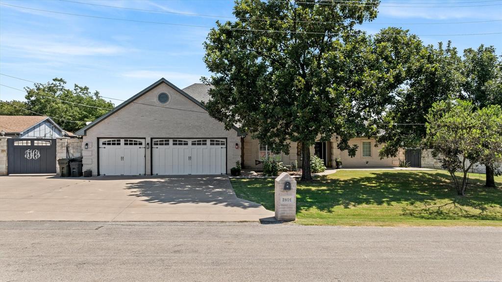 a house with a tree in front of it