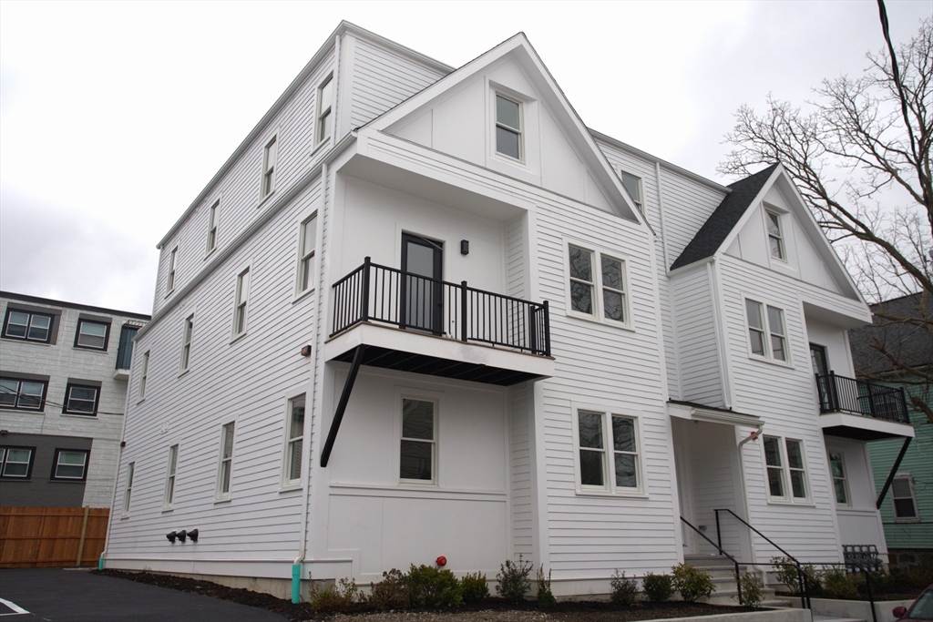 a view of a house with a white door