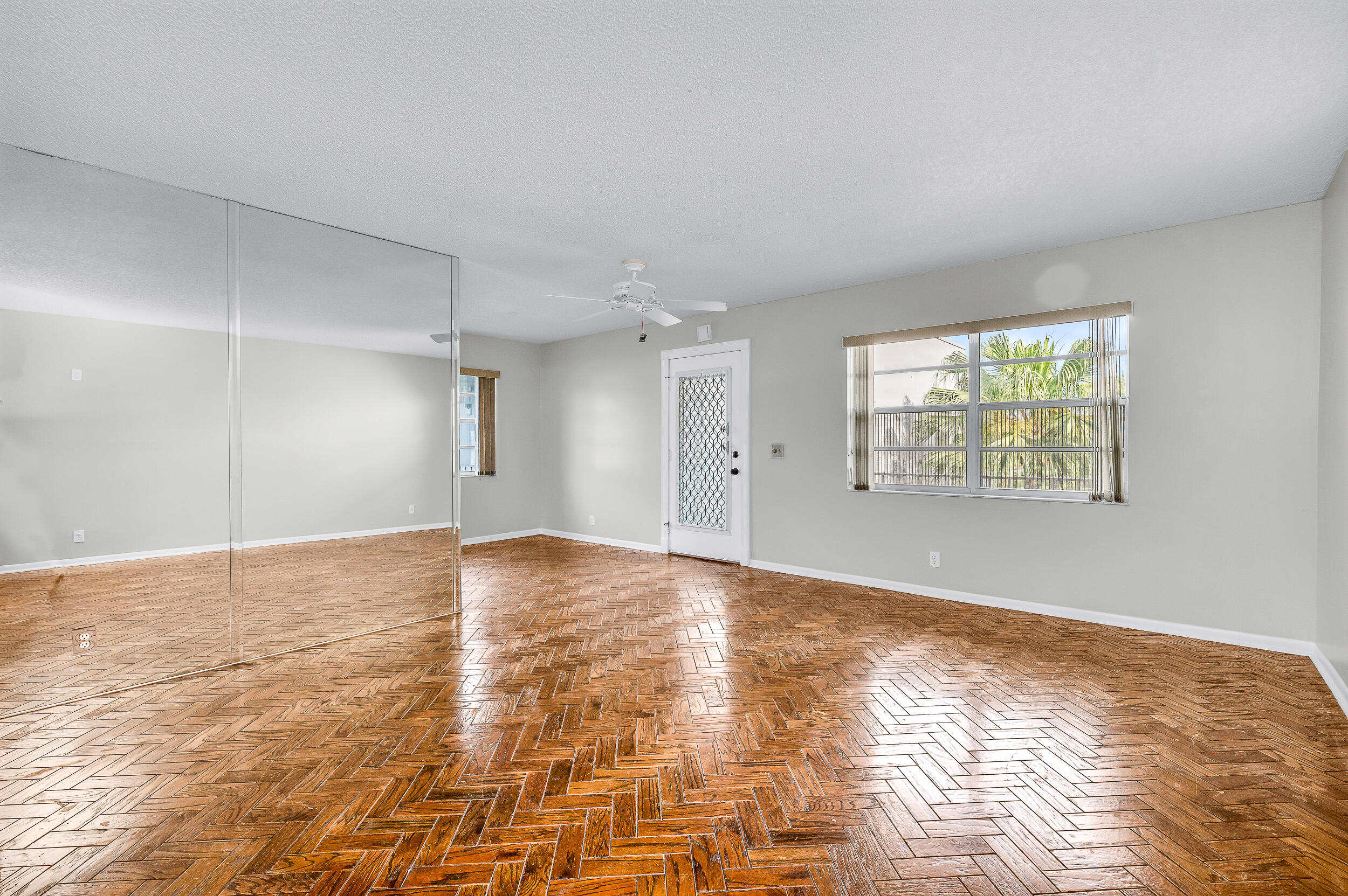 a view of an empty room and window