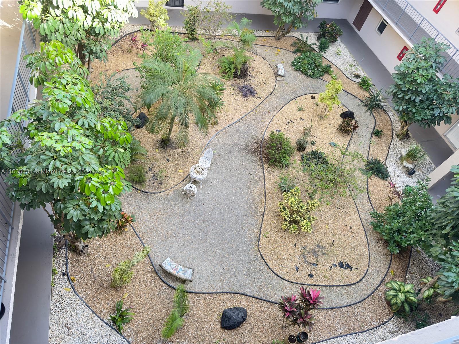 an aerial view of a swimming pool