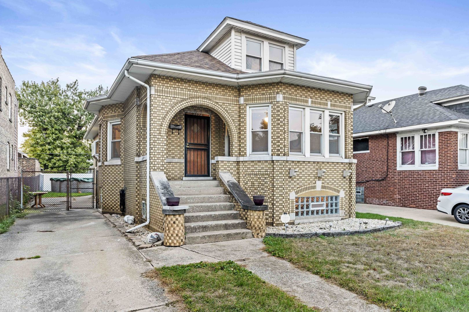 a front view of a house with a porch