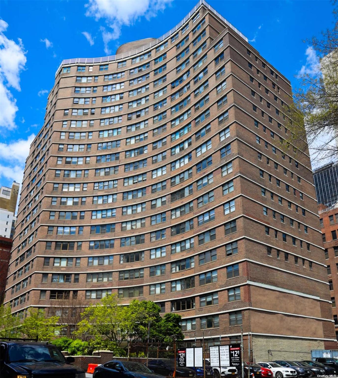 brick building with garage on the right side of the