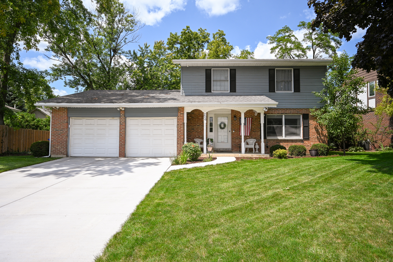 front view of a house with a yard