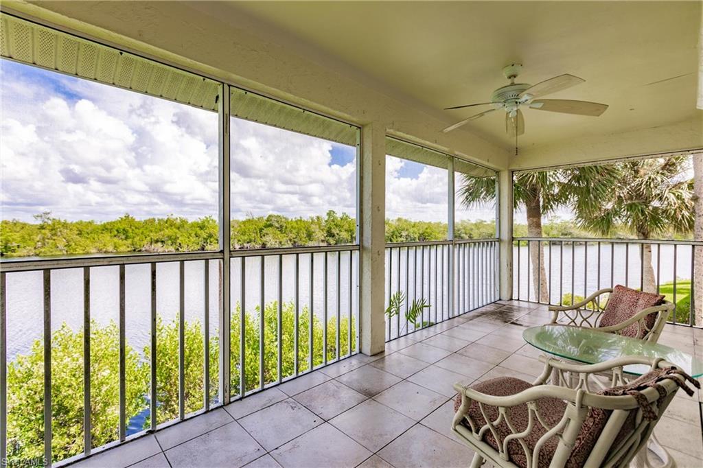 a view of a chairs and table in patio