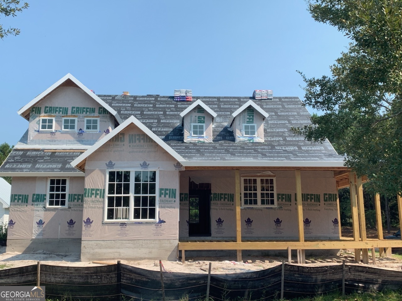 a front view of a house with windows