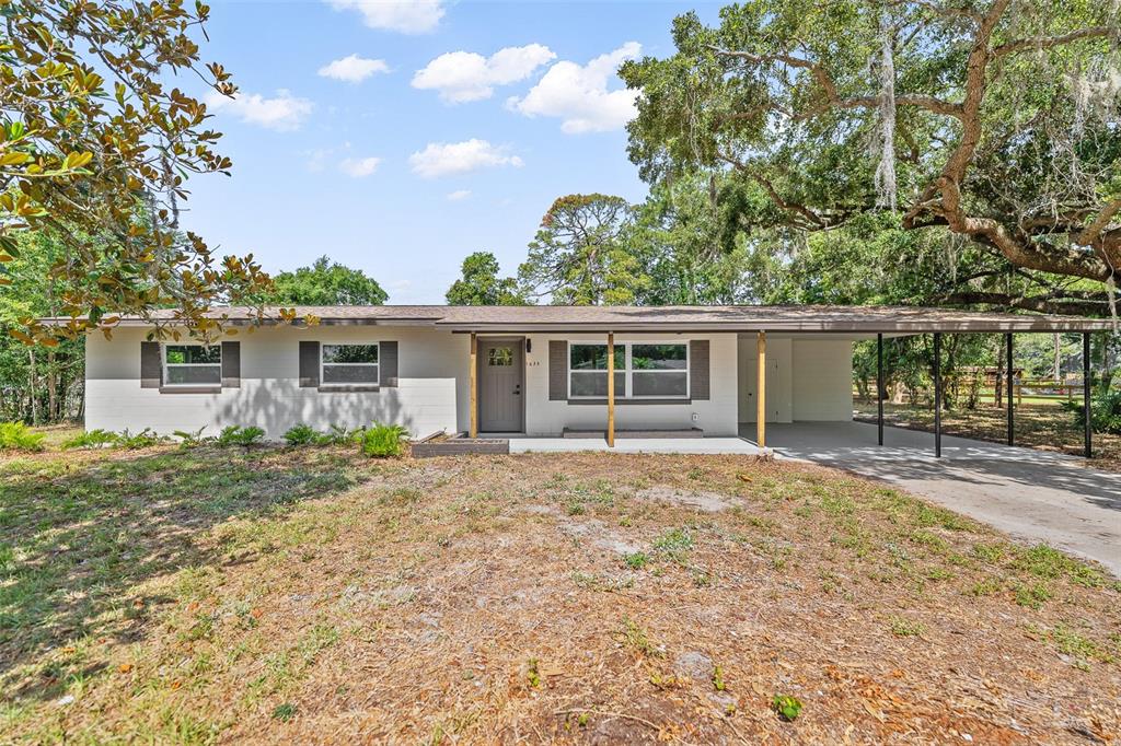 front view of a house with a patio