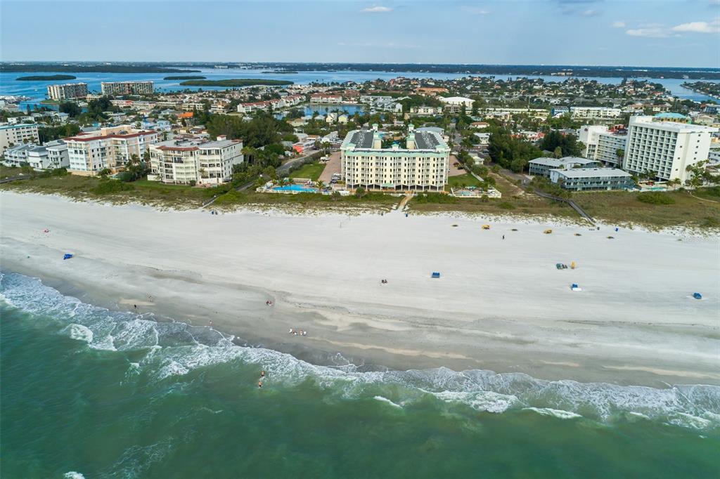 a view of a beach with a city view