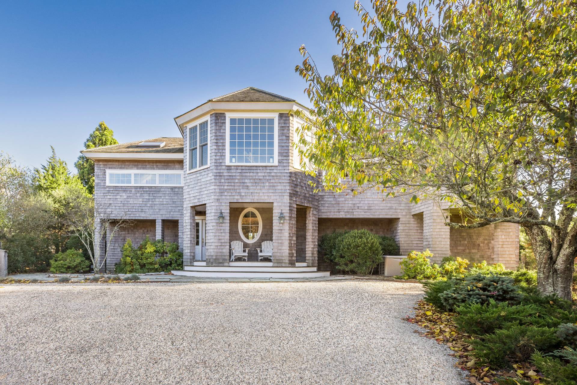 a front view of a house with yard