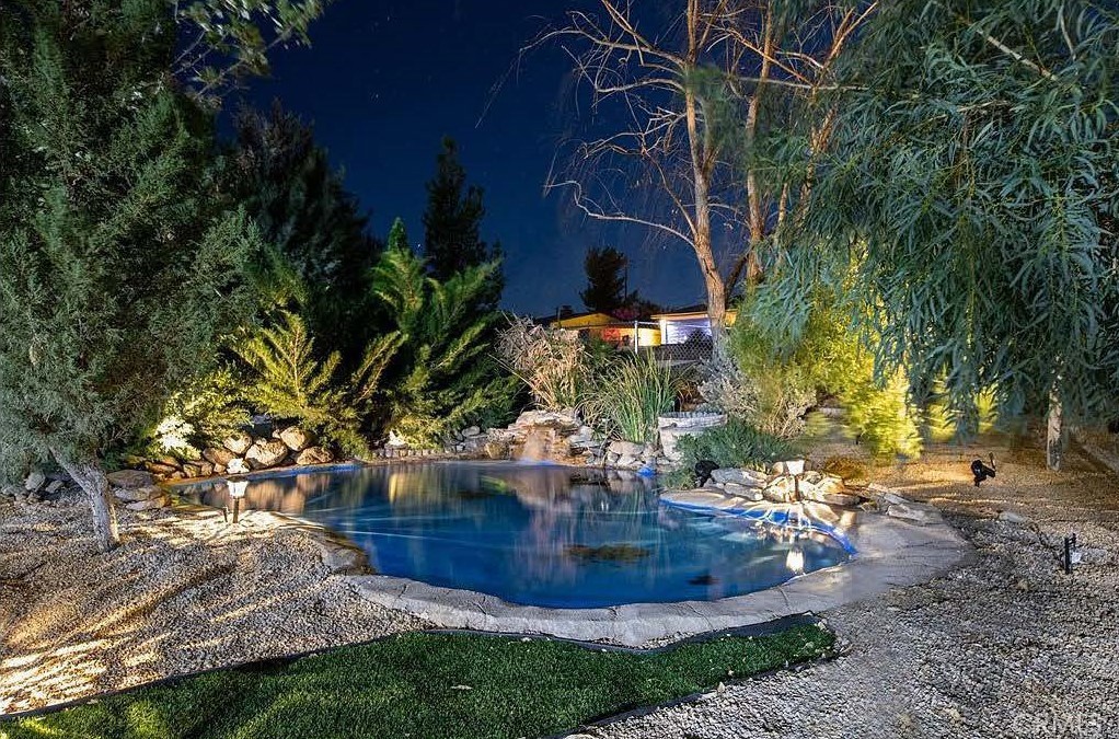 a view of a fountain in the yard