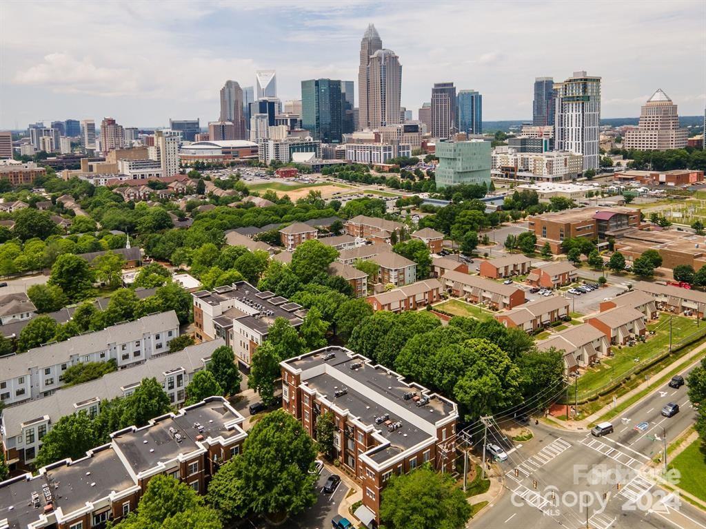 a view of a city with tall buildings