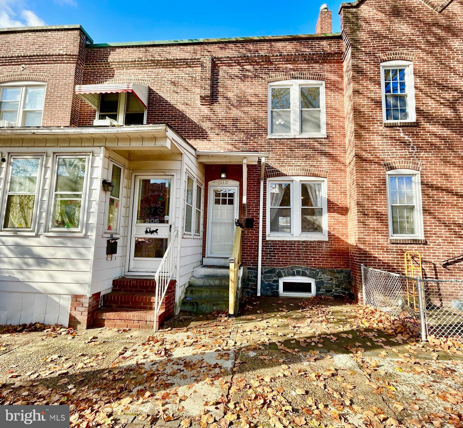 a front view of a house with a patio