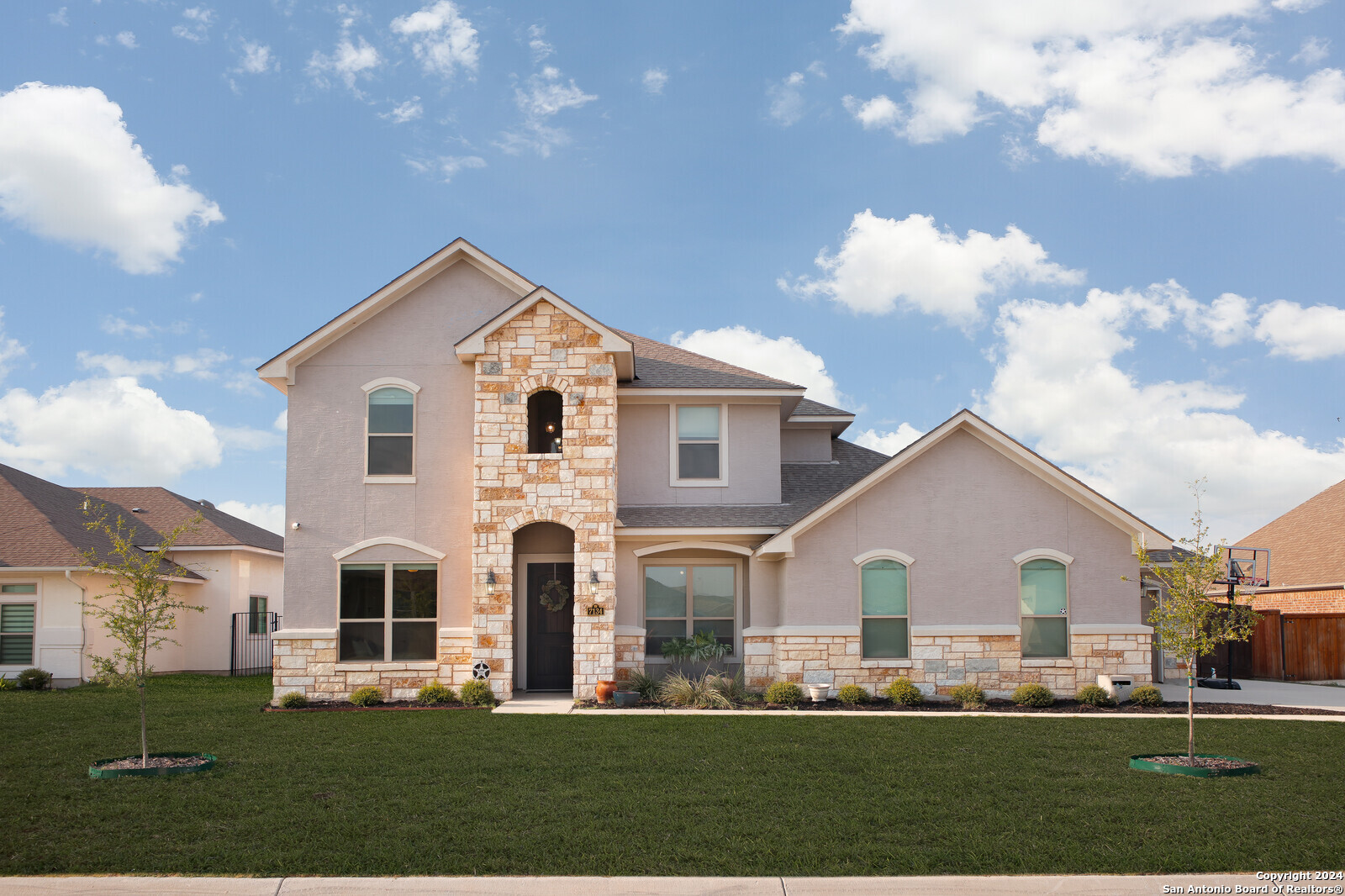 a view of house with yard