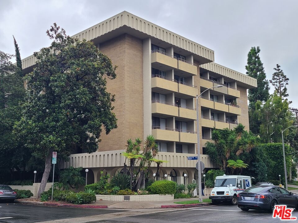 a front view of a building with street view