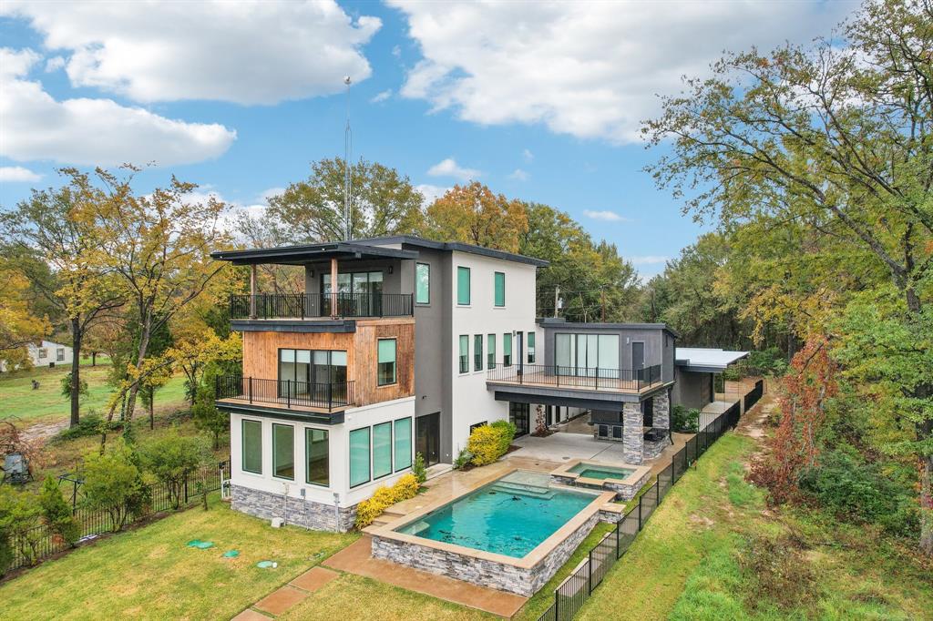 a view of a house with roof deck