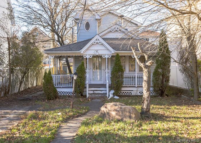 View of front of property featuring covered porch