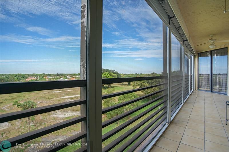 a view of a balcony with an outdoor space