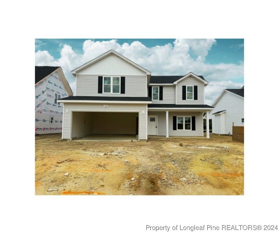 a view of an house with backyard space