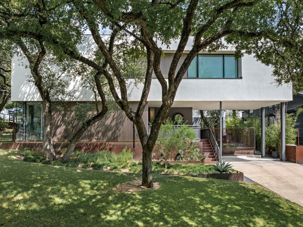 front view of a house with a yard