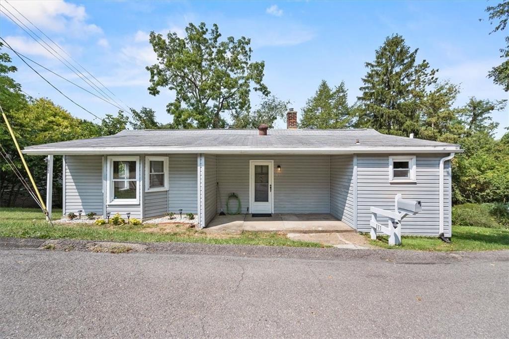 front view of a house with a patio